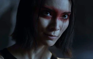 Smiling upon realising that she has gotten away with everything.