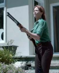 Dr. Thorne with her shotgun, attempting to kill Emily