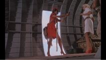 Donning a parachute, Lola intends to leave the others to crash on the pilotless plane.