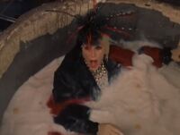 Cruella gets dumped into a giant mixing bowl!