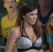 Madison smiling evilly after attacking Gail Kim