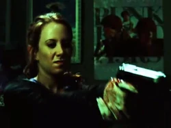 Leslie Gitig Gun.png (511 KB) Leslie as she prepares to kill Fiona Chambliss