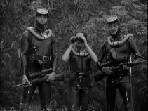 The Latin Woman with her scuba diving team. Notice they are using the same rifles as THRUSH, indicating that they are members of THRUSH.