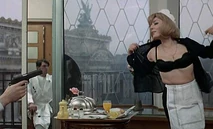 She is forced to undress herself.