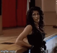 Doing the man's job! She is also extremely devoted, loyal, and servicial like a secretary and assistant combined to her lover, the leader. If only women were like that these days!