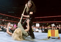 WWEStephanieMcMahon07.jpg (571 KB) Humiliating Trish with a dirty mop