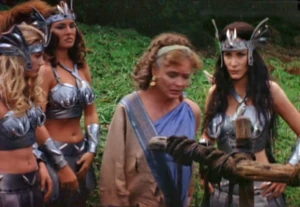 Oversees kidnapping of Hercules's grieving mother