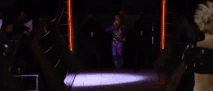 Her entrance in motion.