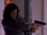 Dana armed with her pistol