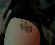 Monahan's distinctive tattoo