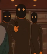 The female robber with her male cohorts (shown via a flashback)