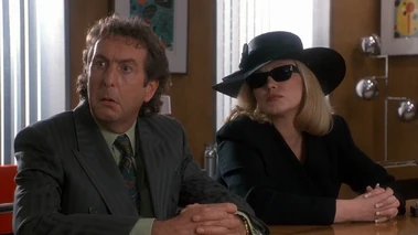 Carrigan and Dibs at the reading of the will.