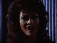 Desire Vampiress 2.jpg (68 KB) Desire with her fangs fully elongated