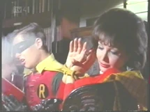 Lydia gasses Robin (Francine York with Burt Ward)