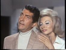 Barbara seducing Matt Helm ( Nancy Kovack with Dean Martin)