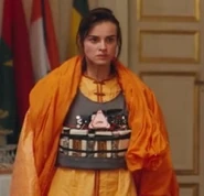 Caroline Orange Bomb.jpg (56 KB) Caroline donning a burkha and an explosive vest