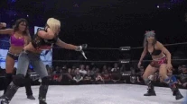 Rebel Heel Turn.gif (694 KB) Rebel turns heel and attacks Velvet Sky from behind