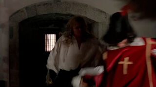 She hids behind a guard ...