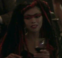 An asian client watches the sadistic show