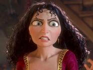 Mother Gothel's evil scowl as she refuses to let Rapunzel see the lanterns