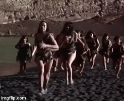 Martine Beswick beach running.gif