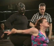 Lexie as The Spider Lady facing Thunderkitty