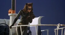 After the submarine surfaces, Catwoman observes the battle between her men and the Dynamic Duo