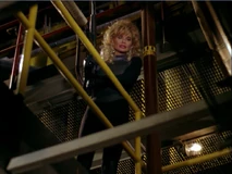 Medusa looks on as children battle her warriors