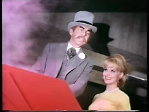 Lisa enjoys the Hatter's torture chamber (Diane McBain with David Wayne)