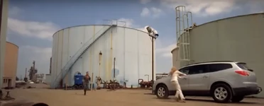 The villainous Sarah open the door at full speed for...