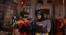 "Snap on the batcuffs," Batman tells Robin
