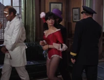 Screenshot 8532.png (1.63 MB) The final glance back at her captor as she is led away in handcuffs to jail