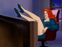 Putting her feet up in Marcello's office