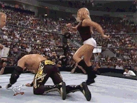 Summerslam 2000: Kicking Eddie Guerrero in the ribs during a mixed tag match