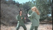 Henchwoman Kim (Eileen Saki) vs Lacy Bond (Sondra Currie)