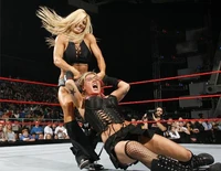 Pulling Ashley around by her hair