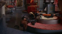Catwoman falls and is knocked out, losing her mask!