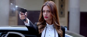 She then tries to kill the female police officer but the IT guy steps in and takes the bullet
