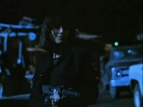 After having won the hide-and-seek game against Johnny, a smiling and victorious Jewels is about to pull the trigger