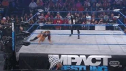 Madison (in her villainous disguise) attacking Mickie James