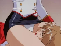 ...and lands on her, causing Aika to suffer underneath her