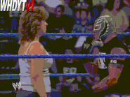 Vickie delivers a slap to Rey Mysterio