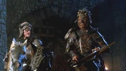 The Deadite Captain and Evil Ash arrive inside Castle Kandar.
