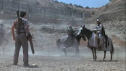 Ash Williams watches The Wise Man ride to Arthur's side.