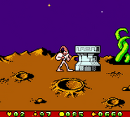Jim next to a pillar, which he can move by bumping into it or shooting.