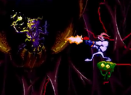 Queen Slug-for-a-Butt attacks Jim in the final level of Earthworm Jim