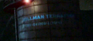 Hillman Terraform company name, as seen written on the side of the terraforming tower in "Displacement". Increased brightness and contrast for visibility.