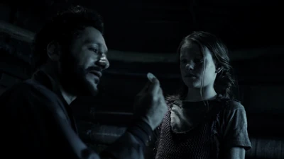 Kamal attempts to calm a child