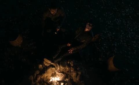 Holden and The Investigator at a camp fire