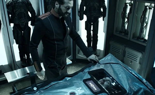 Kamal puts Lt. Lopez in a body bag